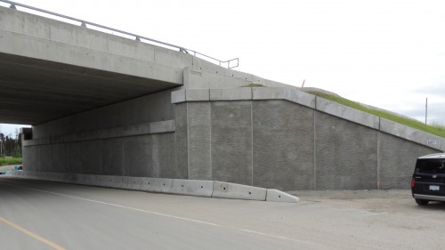 Two-stage geogrid-reinforced wall at bridge abutment, South Fraser Perimeter Rd, Delta, BC
